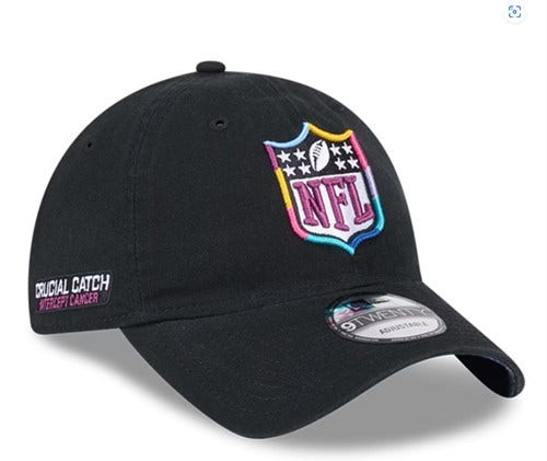 A solid black hat with NFL logo in front and a crucial catch patch on the right side. 